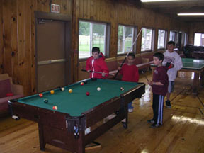 Playing pool in the lodge
