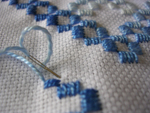 The journey of 2,000 kloster blocks begins with one satin stitch